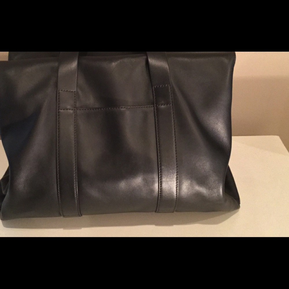 Aritzia’s Six Eleven black leather McDuffle - Picture 5 of 14
